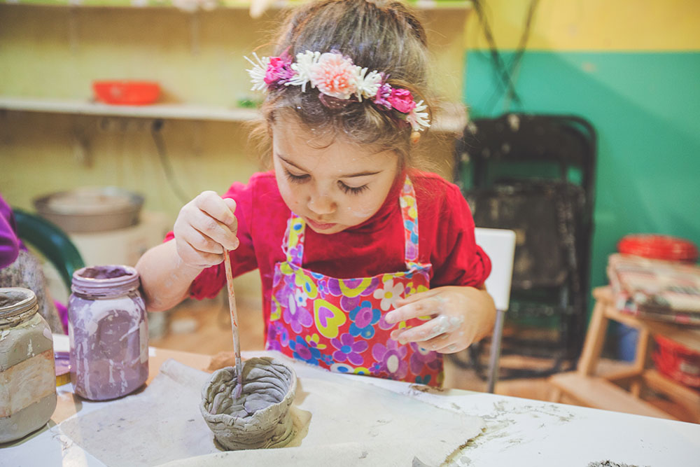 Girl At Pottery Workshop at a Preschool & Daycare Serving New Braunfels, TX