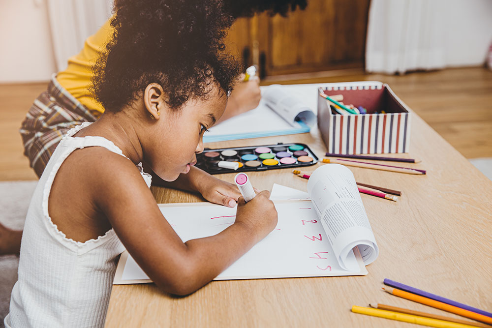 kids doing homework at a Preschool & Daycare Serving New Braunfels, TX