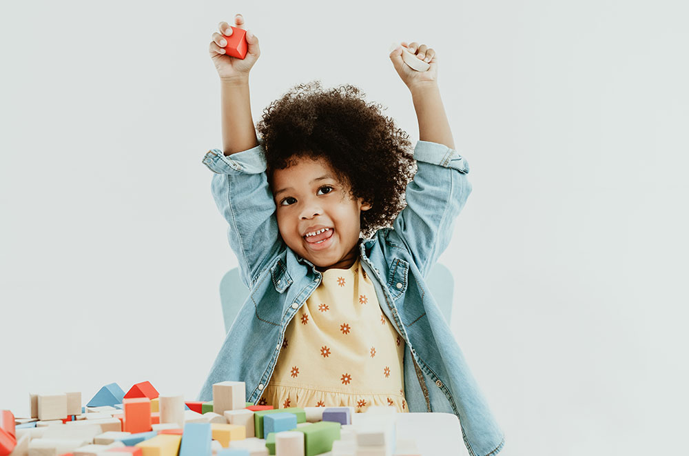 young black kindergarten girl at a Preschool & Daycare Serving New Braunfels, TX